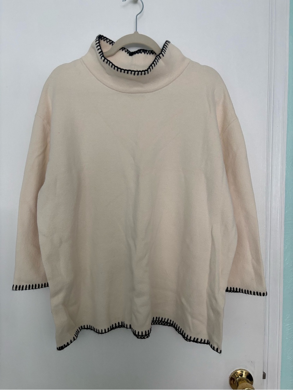 Cream Turtleneck Sweater with Black Trim